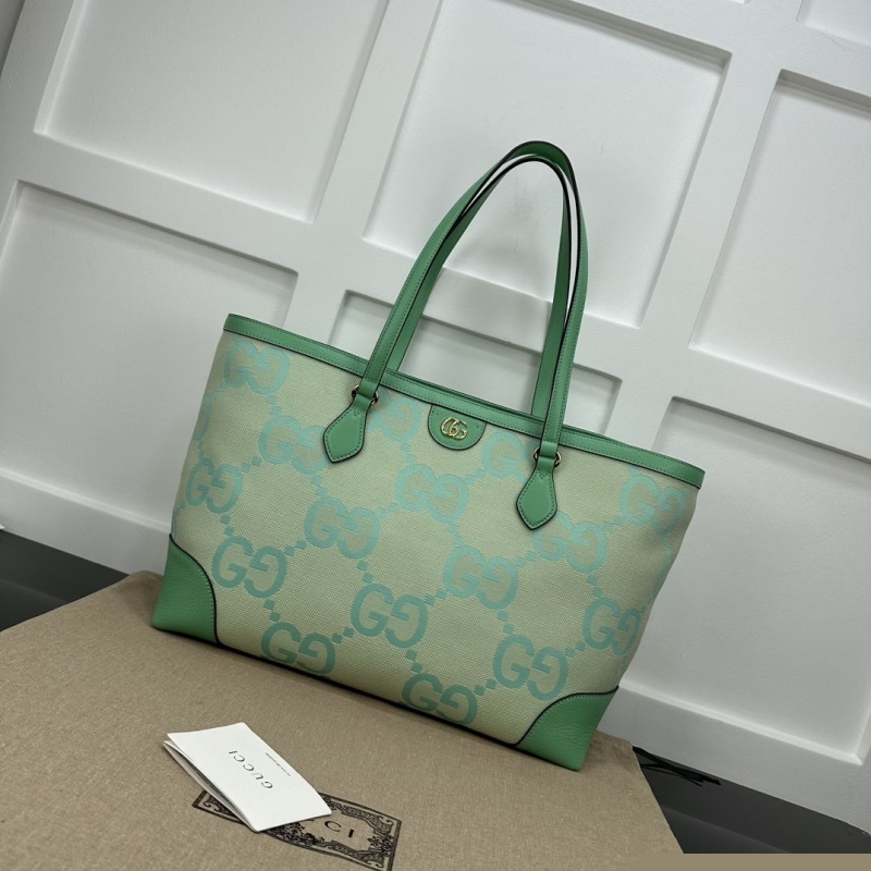 G*u*i shopping bags